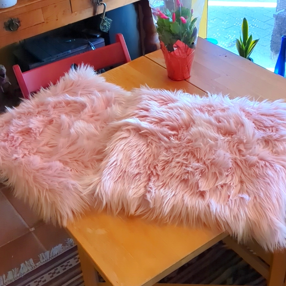 Two beautiful pink faux suede and fur pillow cases
